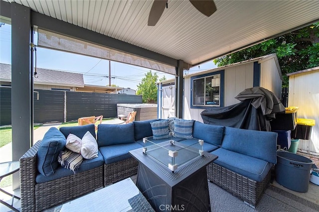 637 N 2nd Ave, Upland, CA 91786 - fenced backyard featuring outdoor lounge area, a ceiling fan, a hot tub, and an outbuilding