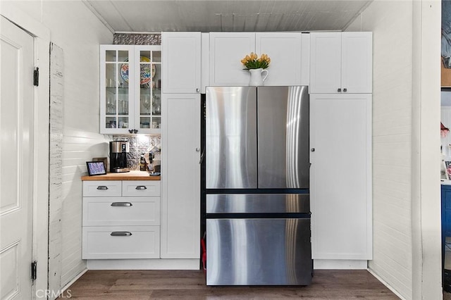 637 N 2nd Ave, Upland, CA 91786 - kitchen with freestanding refrigerator, white cabinets, dark wood-style floors, and glass insert cabinets