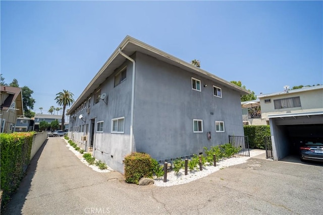 610 N Oakland Ave, Pasadena, CA 91101 - view of side of home featuring stucco siding