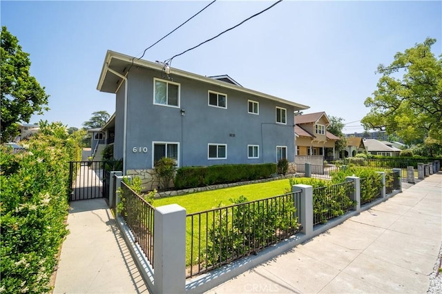 610 N Oakland Ave, Pasadena, CA 91101 - view of side of home featuring stucco siding