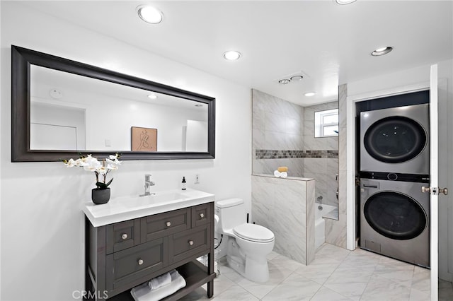 1094 Katella St, Laguna Beach, CA 92651 - full bath with stacked washer / drying machine, marble finish flooring, vanity, recessed lighting, and washtub / shower combination