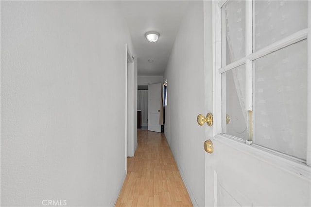 178 E 49th St, Los Angeles, CA 90011 - corridor featuring light wood finished floors