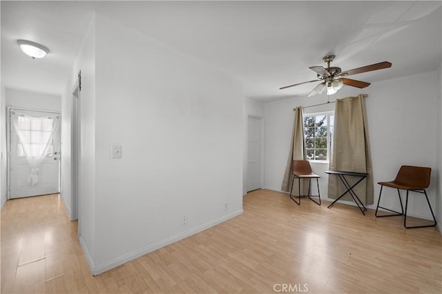178 E 49th St, Los Angeles, CA 90011 - empty room with light wood-style flooring and a ceiling fan