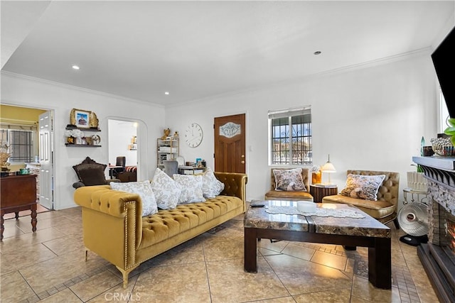 178 E 49th St, Los Angeles, CA 90011 - tiled living room featuring ornamental molding, arched walkways, and recessed lighting