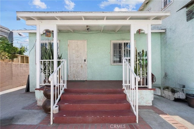 178 E 49th St, Los Angeles, CA 90011 - entrance to property featuring stucco siding