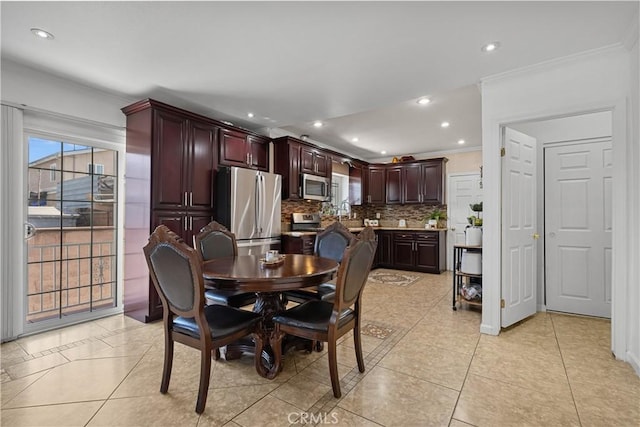 178 E 49th St, Los Angeles, CA 90011 - dining area featuring ornamental molding, light tile patterned flooring, and recessed lighting