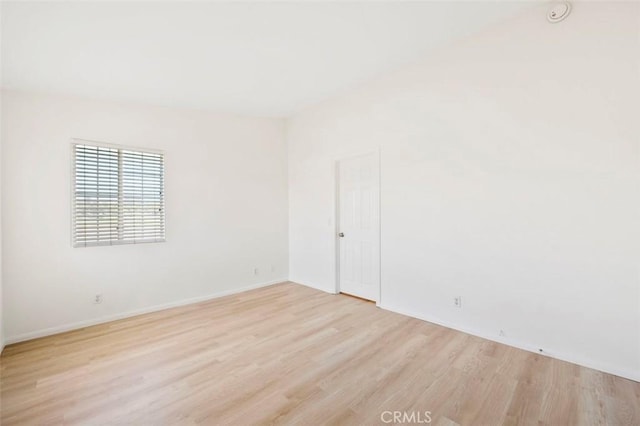 42140 Lyndie Ln Unit 12, Temecula, CA 92591 - empty room with light wood-type flooring and a smoke detector