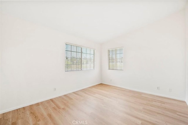 42140 Lyndie Ln Unit 12, Temecula, CA 92591 - empty room with light wood finished floors and lofted ceiling