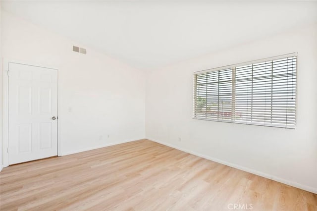 42140 Lyndie Ln Unit 12, Temecula, CA 92591 - empty room featuring light wood-style flooring and baseboards