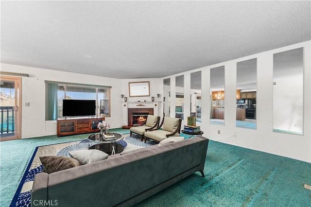 6991 Caminito Perico, San Diego, CA 92119 - living room with carpet flooring, a tiled fireplace, and a textured ceiling