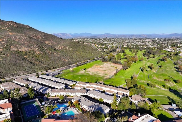 6991 Caminito Perico, San Diego, CA 92119 - aerial view of property and surrounding area with a mountainous background, a local golf course, and nearby suburban area