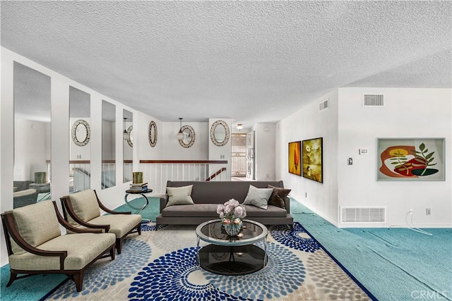6991 Caminito Perico, San Diego, CA 92119 - living room with carpet flooring and a textured ceiling