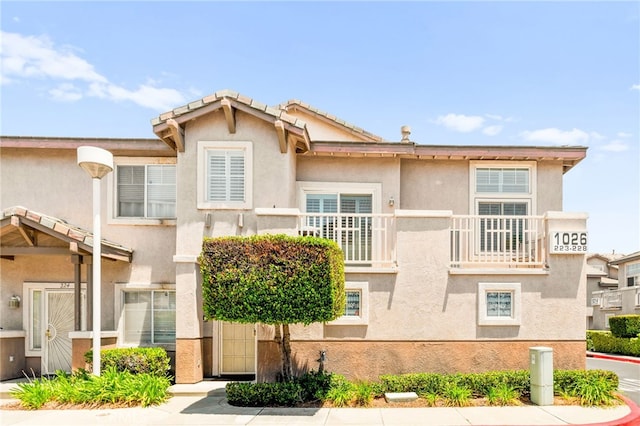 1026 N Turner Ave Unit 223, Ontario, CA 91764 - view of front of house featuring stucco siding