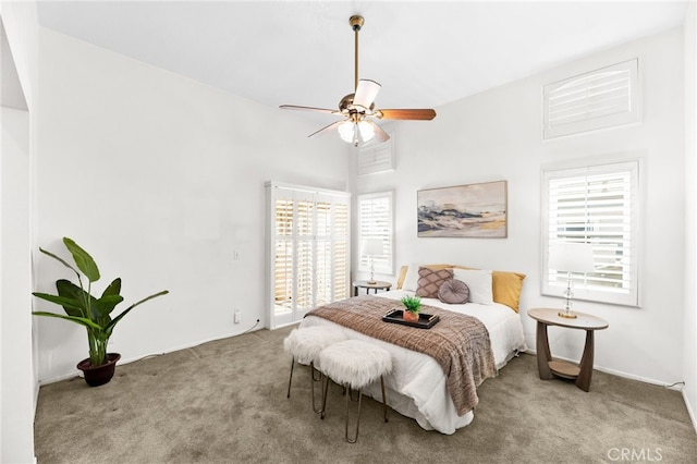 1026 N Turner Ave Unit 223, Ontario, CA 91764 - carpeted bedroom featuring multiple windows, access to outside, and a ceiling fan