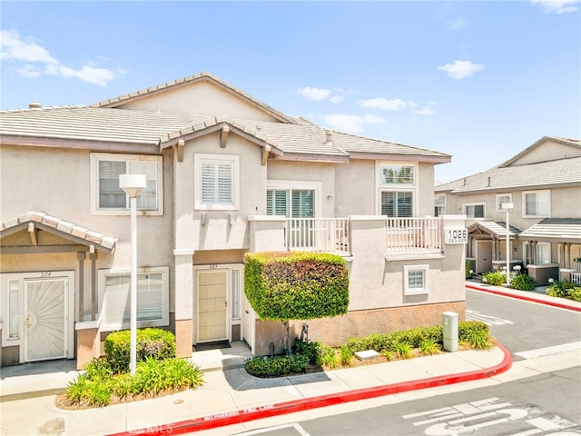 1026 N Turner Ave Unit 223, Ontario, CA 91764 - townhome / multi-family property featuring stucco siding