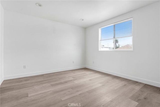 2437 Malabar St, Los Angeles, CA 90033 - empty room featuring light wood finished floors and baseboards