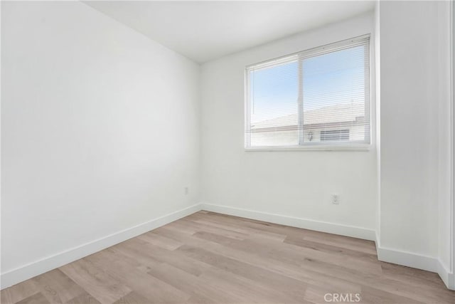 2437 Malabar St, Los Angeles, CA 90033 - empty room with light wood-style flooring and baseboards