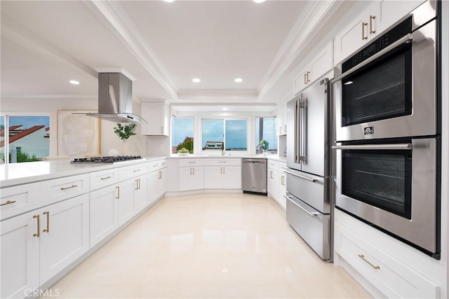 3823 Via Manzana, San Clemente, CA 92673 - kitchen featuring appliances with stainless steel finishes, island exhaust hood, crown molding, white cabinets, and light countertops