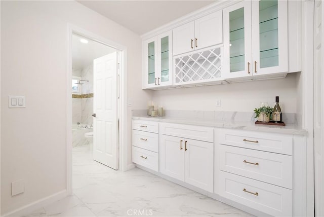 3823 Via Manzana, San Clemente, CA 92673 - indoor dry bar featuring light marble finish floors and baseboards