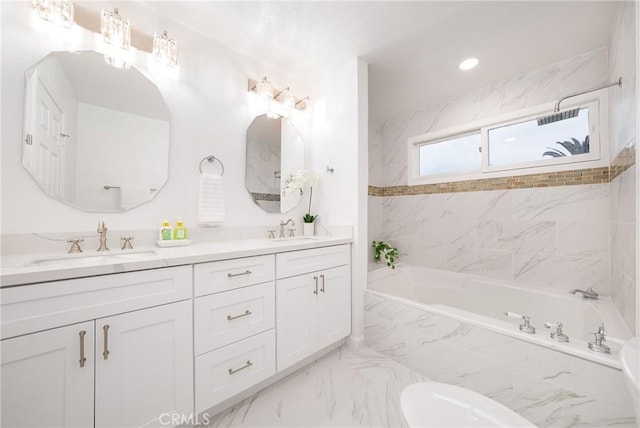 3823 Via Manzana, San Clemente, CA 92673 - bathroom with double vanity, a garden tub, and marble look tile flooring