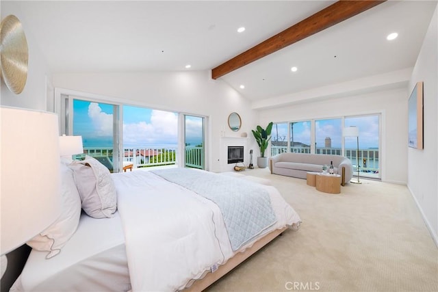 3823 Via Manzana, San Clemente, CA 92673 - carpeted bedroom with access to exterior, recessed lighting, multiple windows, and a glass covered fireplace