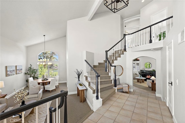 10 Novilla, Laguna Niguel, CA 92677 - foyer entrance with a chandelier, high vaulted ceiling, stairs, and arched walkways