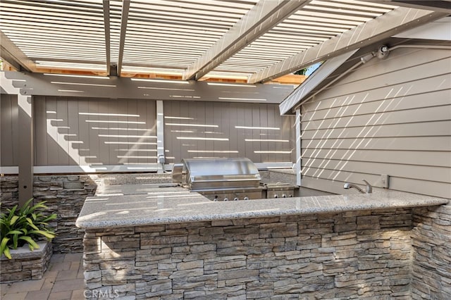 430 Anita St, Laguna Beach, CA 92651 - view of patio with exterior kitchen and a pergola