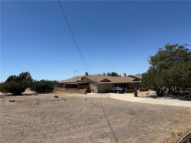 7236 Coyote Trl, Oak Hills, CA 92344 - view of front of property featuring concrete driveway and an attached garage