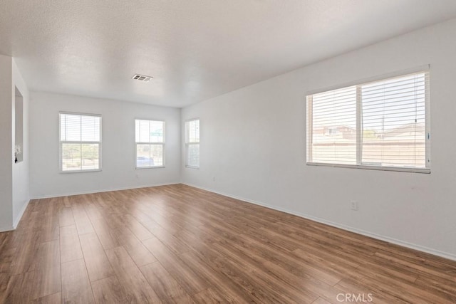 14075 Tourmaline St, Hesperia, CA 92344 - unfurnished room with wood finished floors