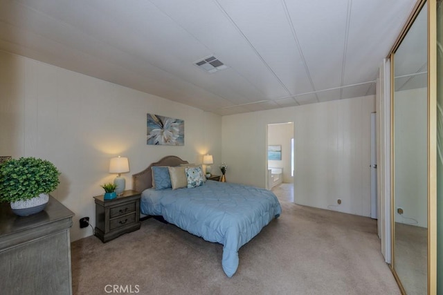 2851 Rolling Hills Dr Unit 255, Fullerton, CA 92835 - bedroom with light colored carpet and connected bathroom