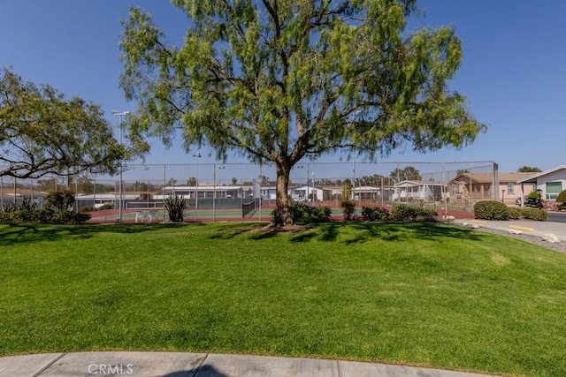 2851 Rolling Hills Dr Unit 255, Fullerton, CA 92835 - view of yard with a tennis court and a residential view