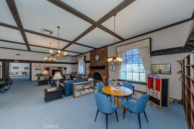 2851 Rolling Hills Dr Unit 255, Fullerton, CA 92835 - carpeted dining space featuring a chandelier, a fireplace, beamed ceiling, and coffered ceiling