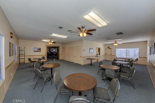 2851 Rolling Hills Dr Unit 255, Fullerton, CA 92835 - carpeted dining room with a textured ceiling and a ceiling fan