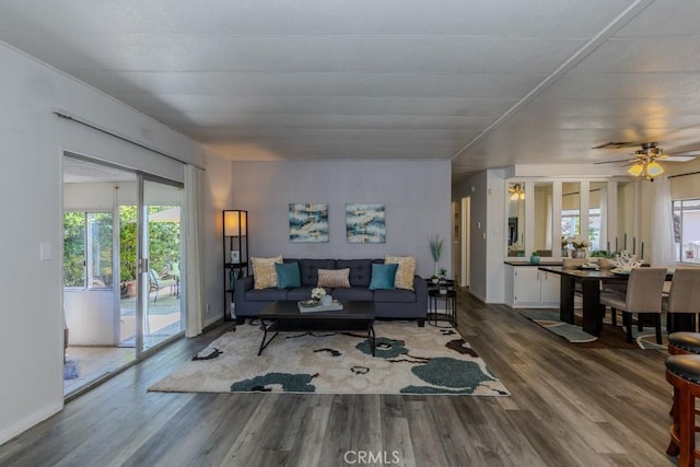 2851 Rolling Hills Dr Unit 255, Fullerton, CA 92835 - living area featuring wood finished floors, healthy amount of natural light, and a ceiling fan