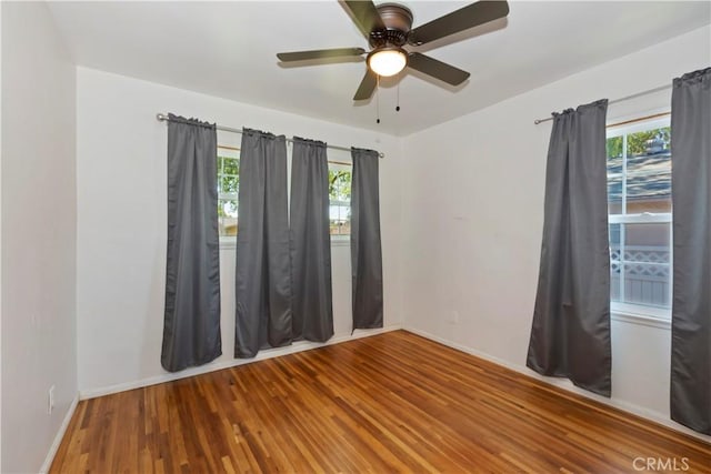 617 N Palm Ave, Upland, CA 91786 - unfurnished room featuring healthy amount of natural light, wood finished floors, and ceiling fan