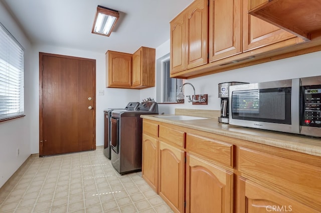 2741 S Walker Ave, San Pedro, CA 90731 - laundry room featuring washer and clothes dryer and light floors
