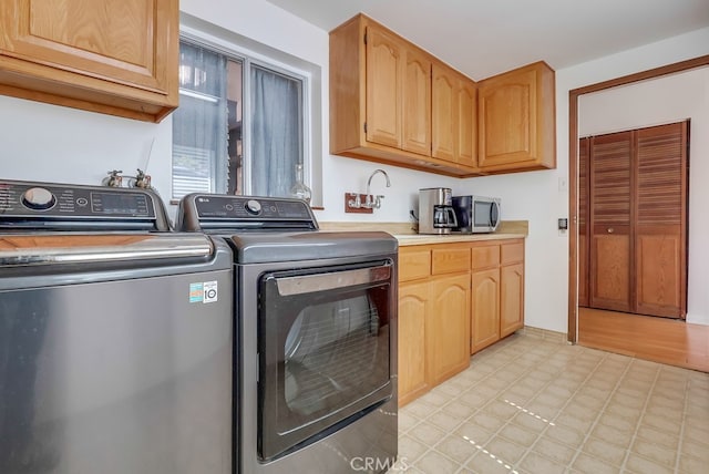 2741 S Walker Ave, San Pedro, CA 90731 - laundry room featuring separate washer and dryer and cabinet space