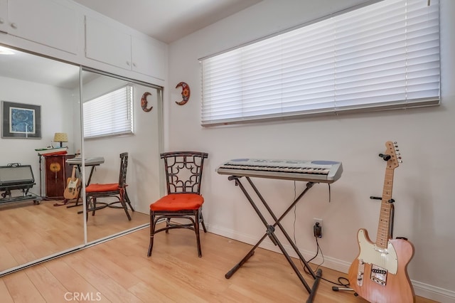 2741 S Walker Ave, San Pedro, CA 90731 - living area featuring light wood-type flooring and baseboards