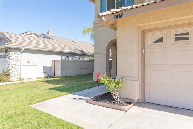 31652 Loma Linda Rd, Temecula, CA 92592 - view of exterior entry featuring stucco siding and a tiled roof