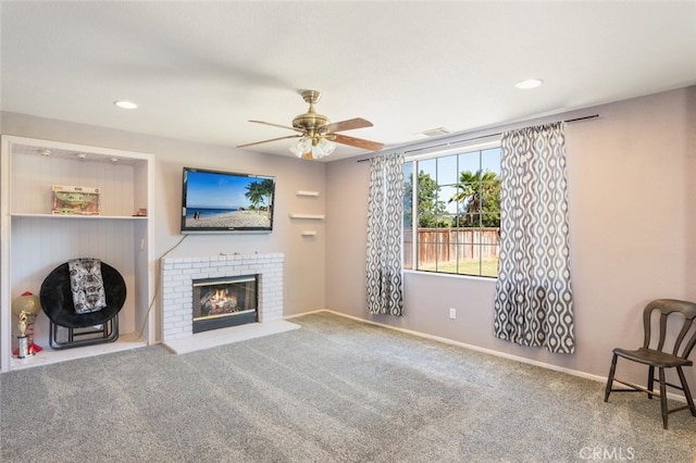 31652 Loma Linda Rd, Temecula, CA 92592 - unfurnished living room featuring a ceiling fan, carpet floors, a brick fireplace, and recessed lighting