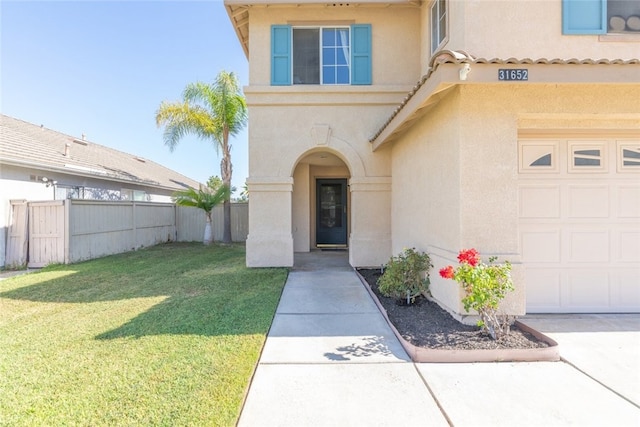 31652 Loma Linda Rd, Temecula, CA 92592 - property entrance with stucco siding and a garage