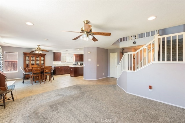 31652 Loma Linda Rd, Temecula, CA 92592 - living room featuring a ceiling fan, stairway, light colored carpet, light tile patterned floors, and recessed lighting