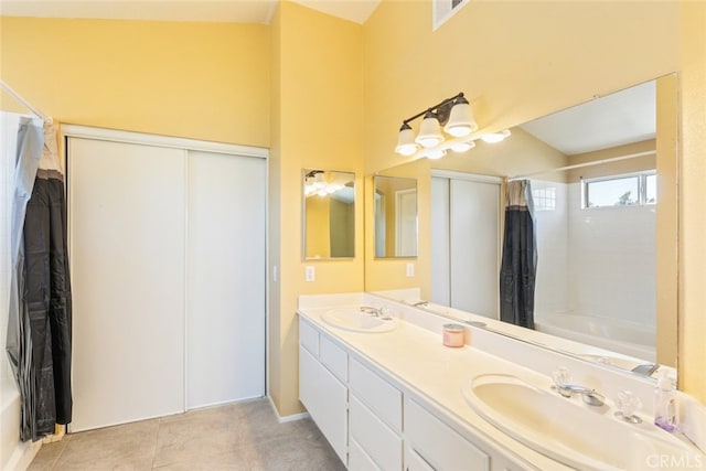 31652 Loma Linda Rd, Temecula, CA 92592 - full bath with double vanity, shower / bath combo with shower curtain, and tile patterned flooring