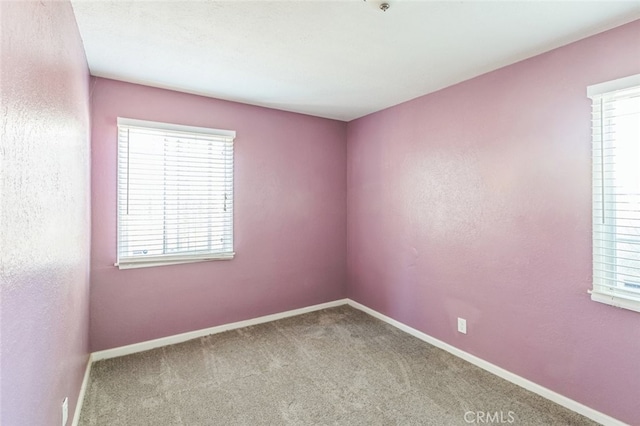 15917 Lee St, Mojave, CA 93501 - carpeted empty room featuring healthy amount of natural light