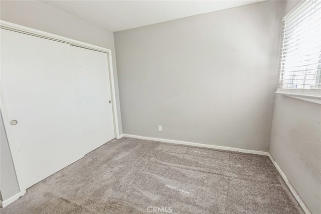 15917 Lee St, Mojave, CA 93501 - unfurnished bedroom featuring carpet and a closet