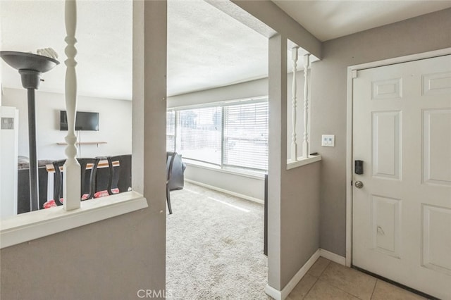 15917 Lee St, Mojave, CA 93501 - carpeted foyer entrance featuring baseboards