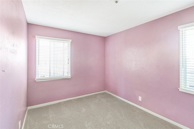 15917 Lee St, Mojave, CA 93501 - unfurnished room with healthy amount of natural light and carpet floors