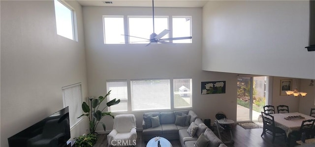 315 Fuente Dr, Guadalupe, CA 93434 - living area featuring a towering ceiling, a ceiling fan, healthy amount of natural light, and wood finished floors