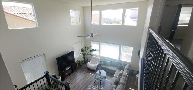 315 Fuente Dr, Guadalupe, CA 93434 - living room featuring a high ceiling, wood finished floors, and a ceiling fan