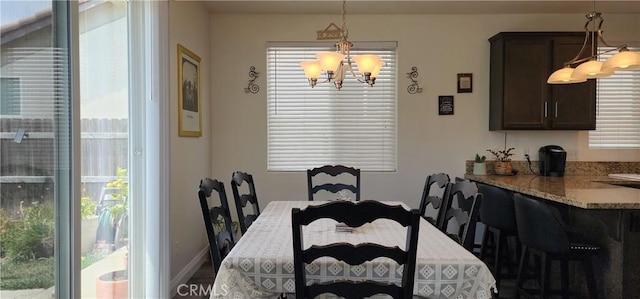 315 Fuente Dr, Guadalupe, CA 93434 - dining room featuring a chandelier and wood finished floors